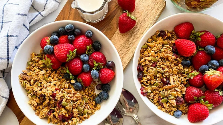 Bowls of granola and berries