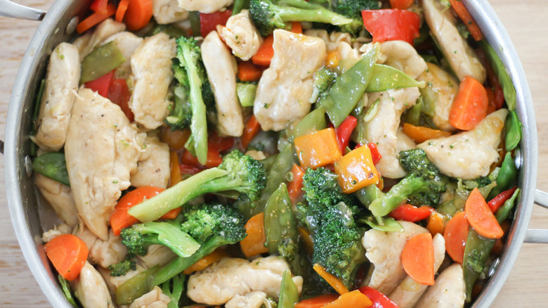 Chicken and vegetables in a skillet