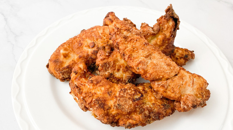 Fried chicken strips on a plate