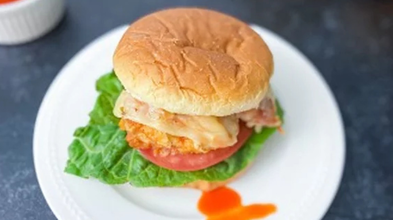 Chicken, tomato, lettuce and cheese sandwich