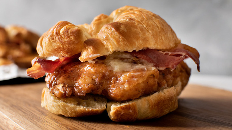 Croissant sandwich with chicken and bacon