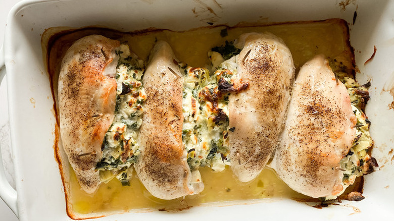 Browned chicken breasts stuffed with cheese and greens
