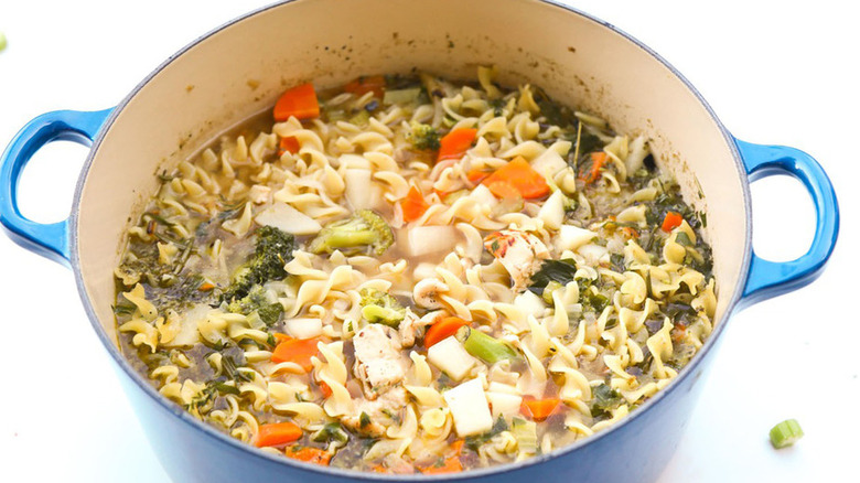 Pot with chicken noodle soup