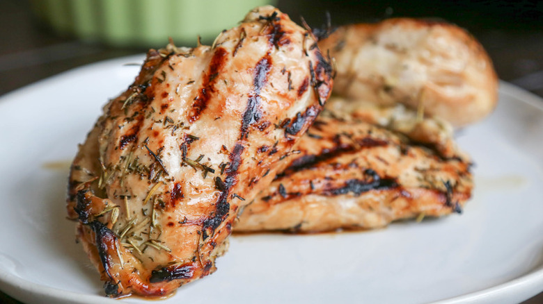Herbed grilled chicken on a plate