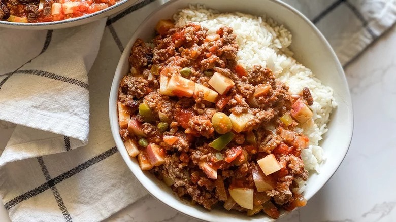 Picadillo with rice in bowl