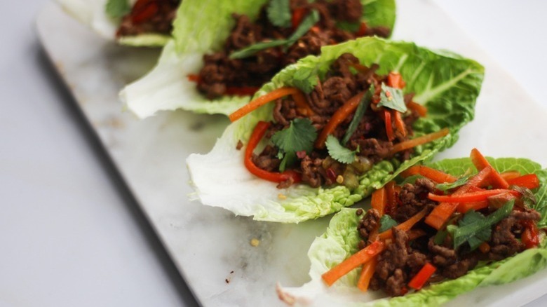 Lettuce wraps on cutting board