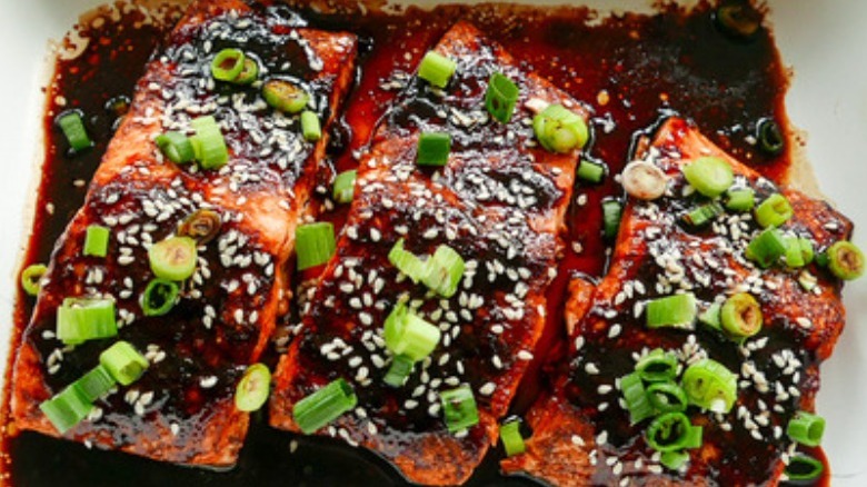 salmon with sauce and scallions