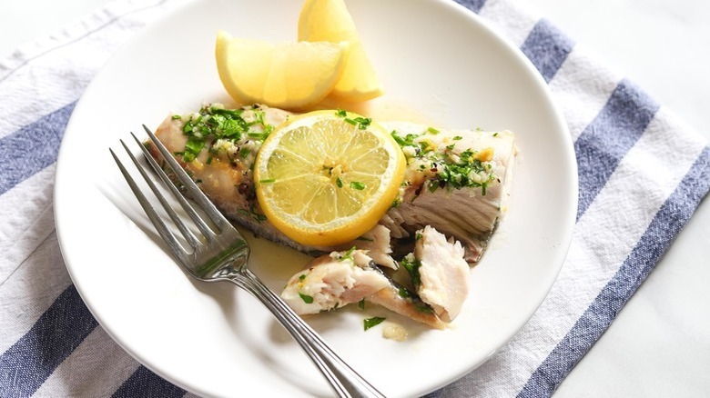 fish with lemon on plate