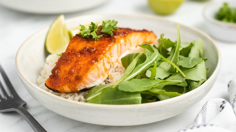 salmon with rice and salad