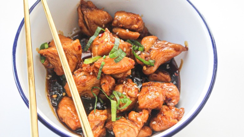 teriyaki chicken with chopsticks