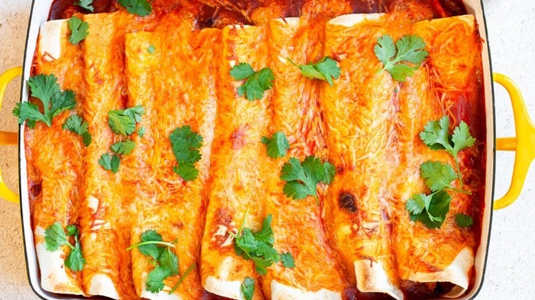 casserole dish of chicken enchiladas