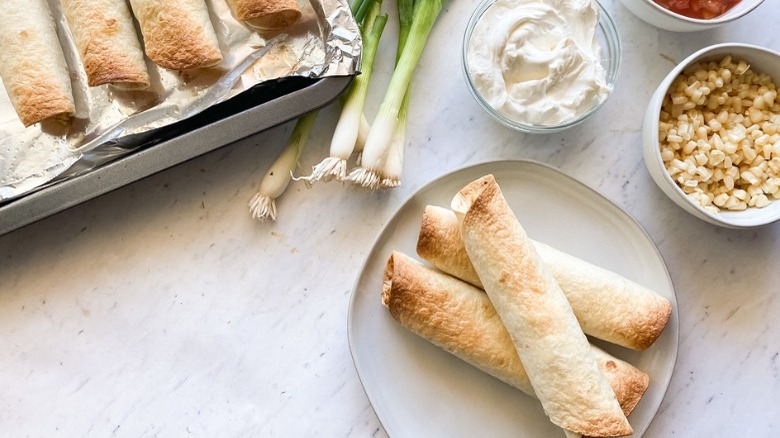 taquitos and garnishes