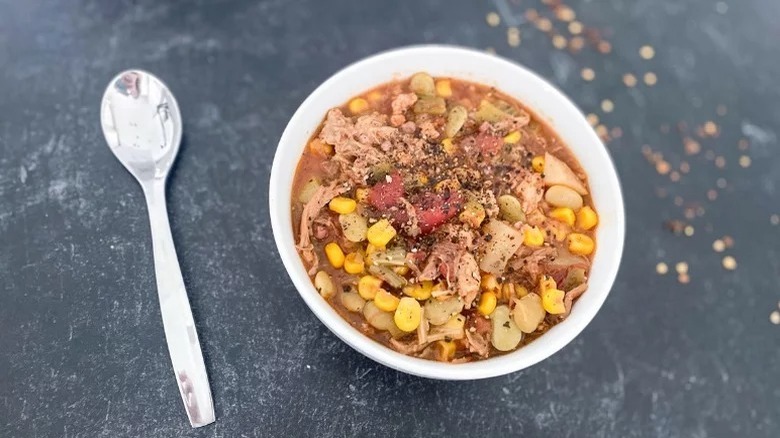 bowl of brunswick stew with spoon