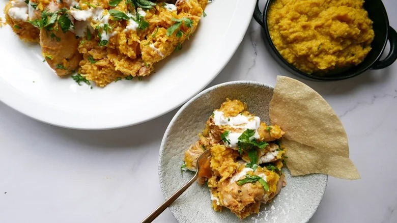 plates of chicken biryani fork