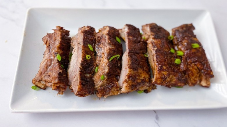 plate of ribs with garnish