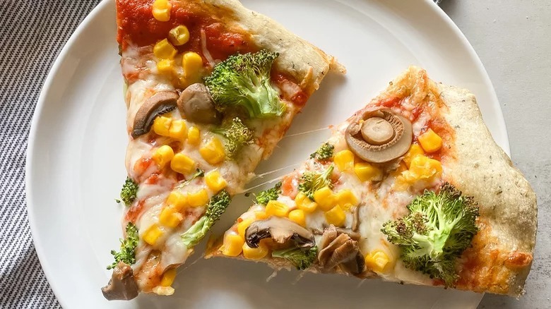 plate of vegetable pizza slices