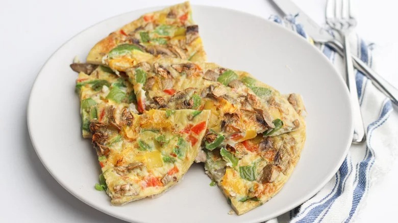 plate of air fryer frittata with fork and knife