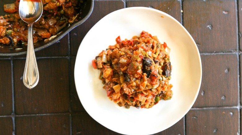 dish of caponata with spoon