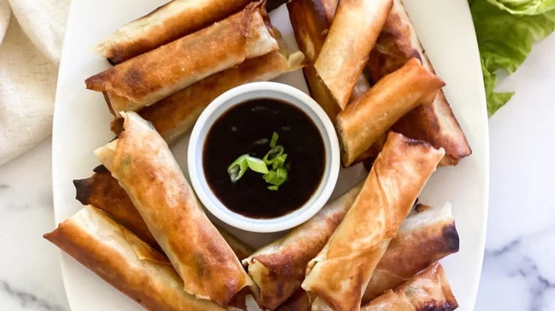 plate of vegetable lumpia with hoisin sauce