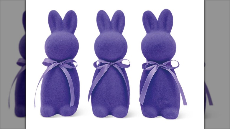 Three purple bunny decorations