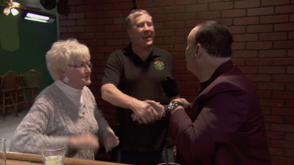 Jon Taffer shaking a man's hand, screenshot from Bar Rescue