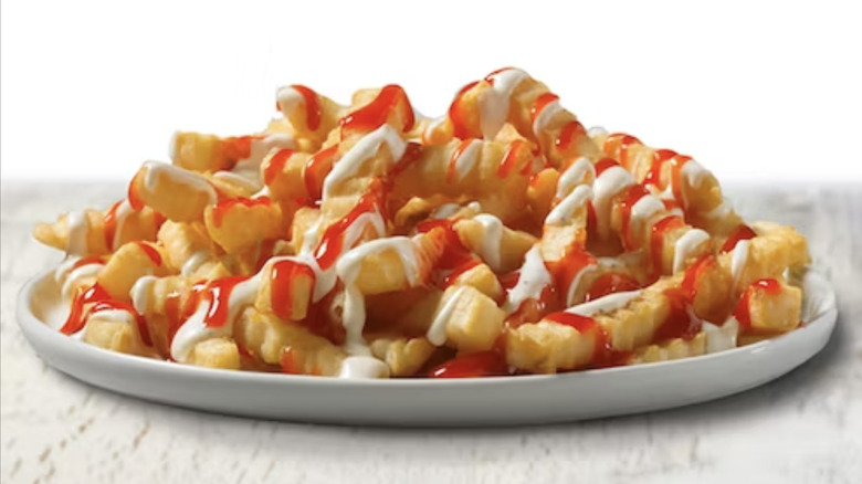 french fries with hot sauce and ranch dressing