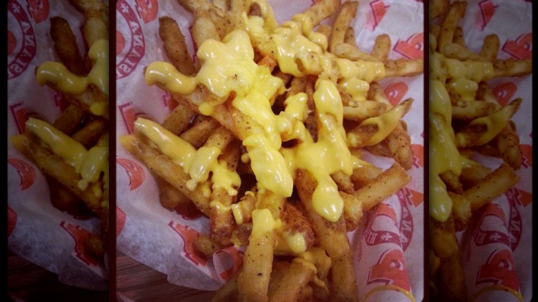 french fries with melted cheese 