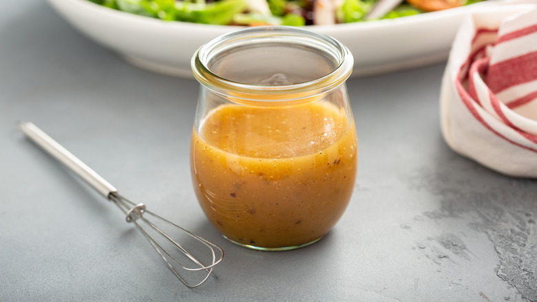 salad dressing jar and whisk