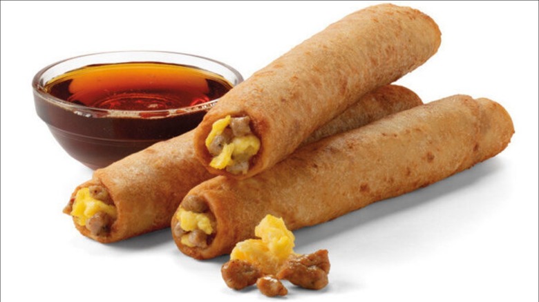 Taquitos on a white background