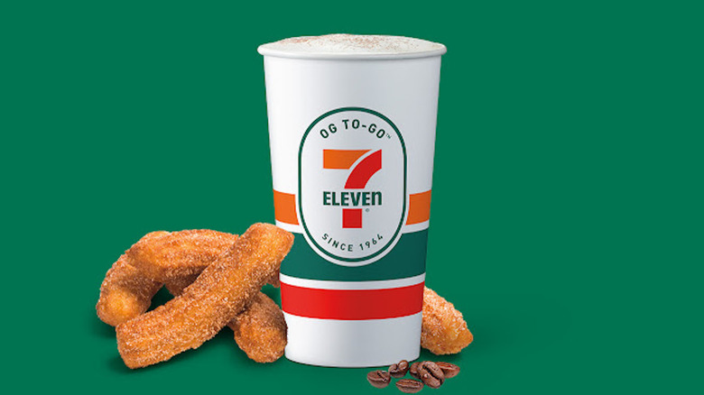Large 7-Eleven Churroccino with churros against green background
