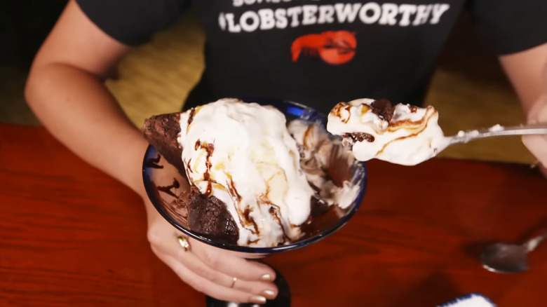 Person eating Brownie Overboard