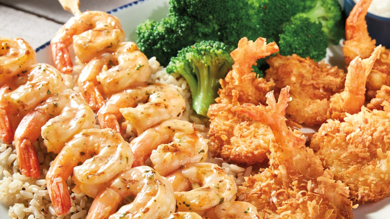 Different Red Lobster shrimp specialties on a plate with sides