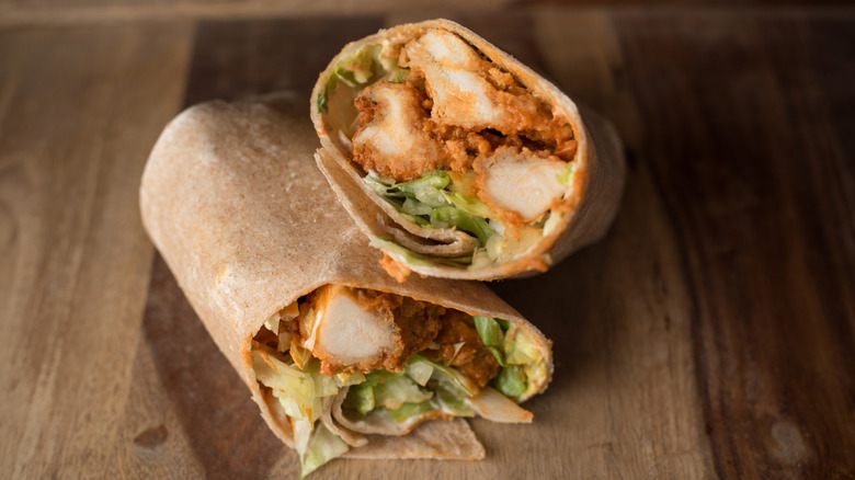 Buffalo chicken wrap sliced in half