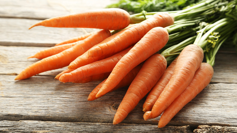 carrots on wood surface