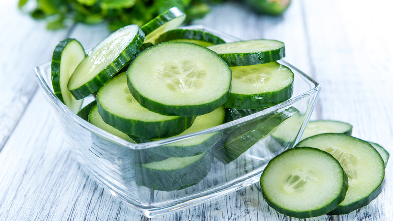 glass container of cucumbers