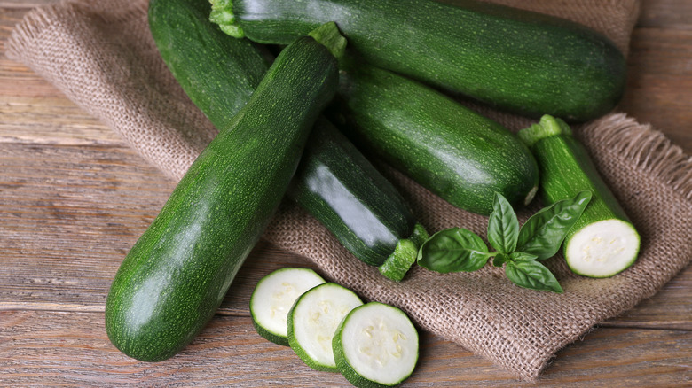 zucchini on burlap and wood