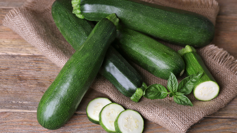 zucchini on burlap and wood