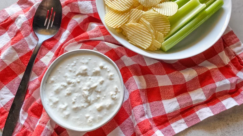 Blue Cheese Dip with chips and celery and cloth