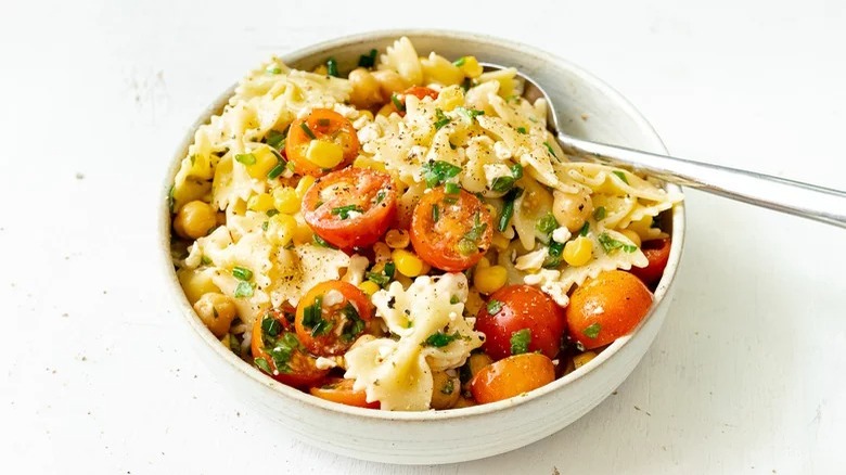 bowl of bow tie pasta salad with spoon