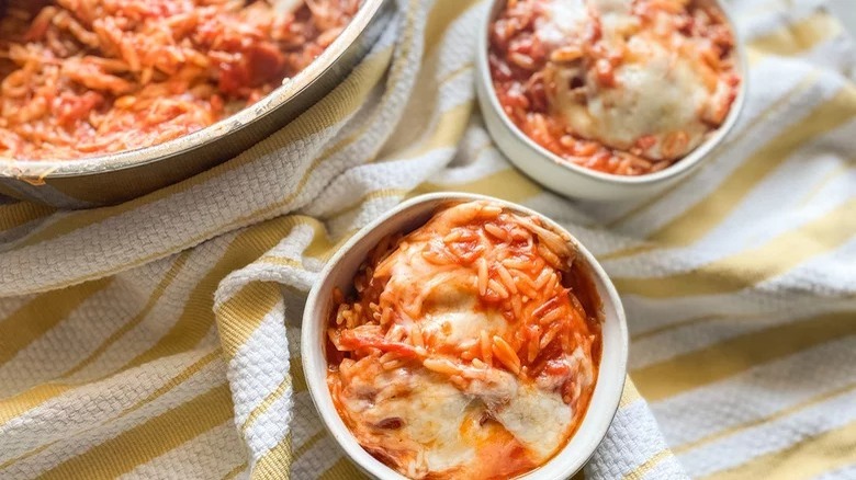 bowls of cheesy orzo bake pasta