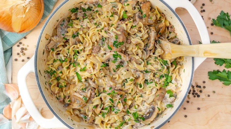 pot of ground beef stroganoff with spoon