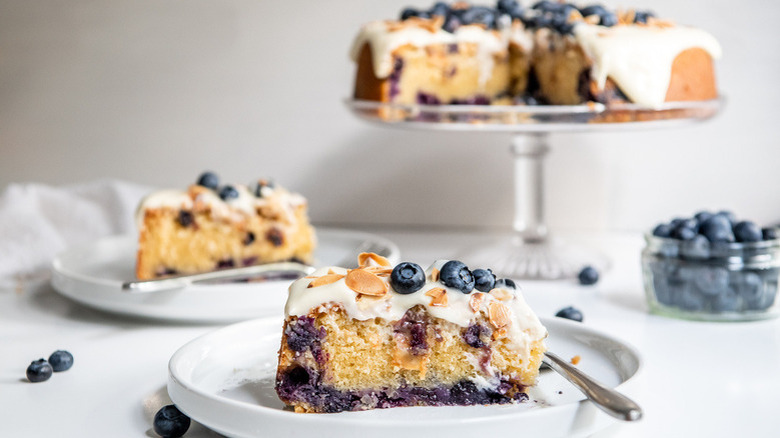 frosted cake with fresh blueberries