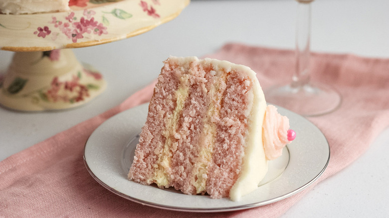 pink cake with white frosting