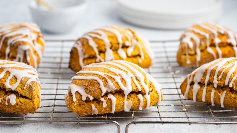 pumpkin scones with white frosting