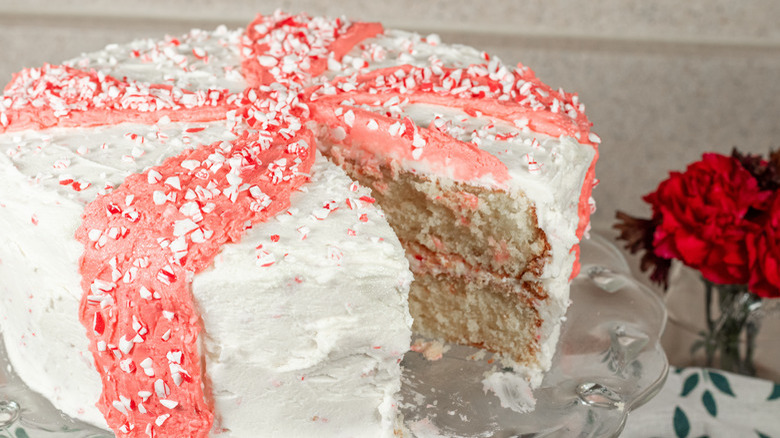 pink and white frosted cake