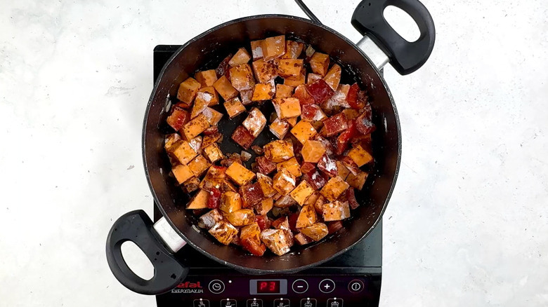 sweet potato, bell pepper, and cornstarch in pan