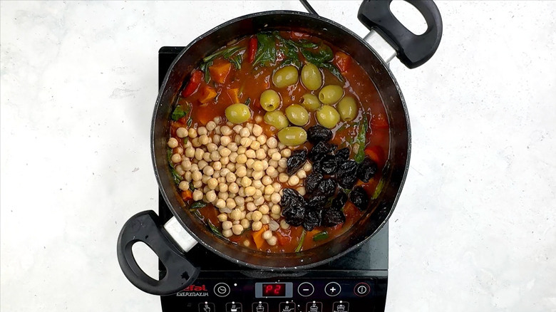 chickpeas, prunes, and olives added to tagine