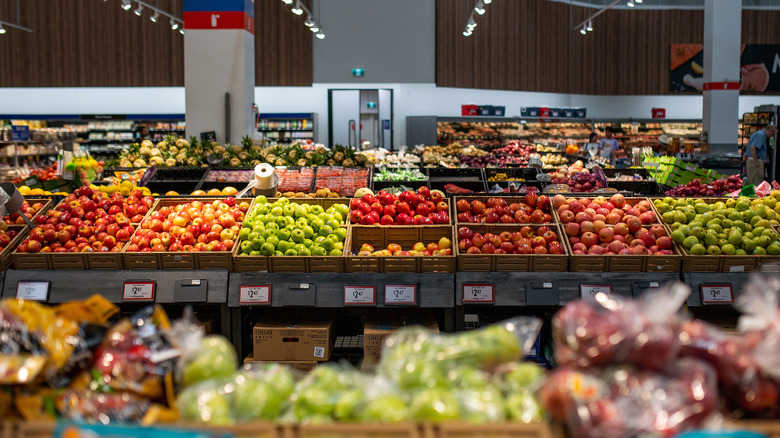 Walmart produce section featuring apples