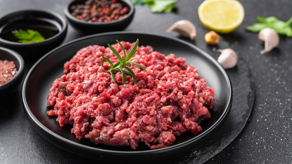 Ground beef on a black plate