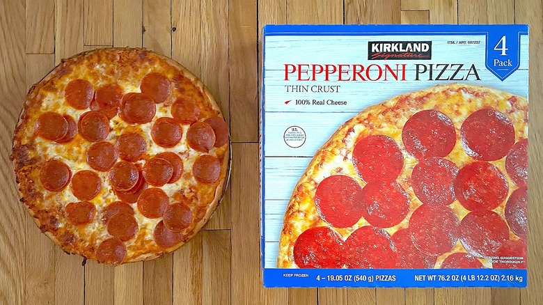 Kirkland Signature Pepperoni Pizza Thin Crust box and whole baked pizza on plate